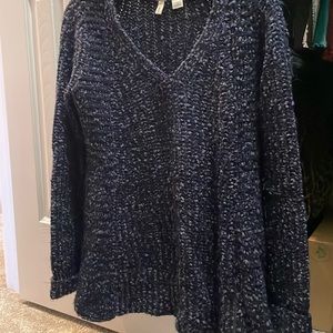 Anthropologie.  Size small.  Sweater with Zipper details on the bottom.
